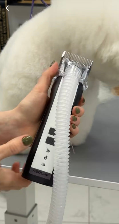 Aeolus Excalibur II dog clipper connected to vacuum system